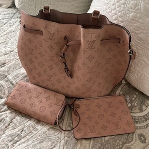 Louis Vuitton Girolata Handbag  Leather Pink used 3 times with matching wallet.